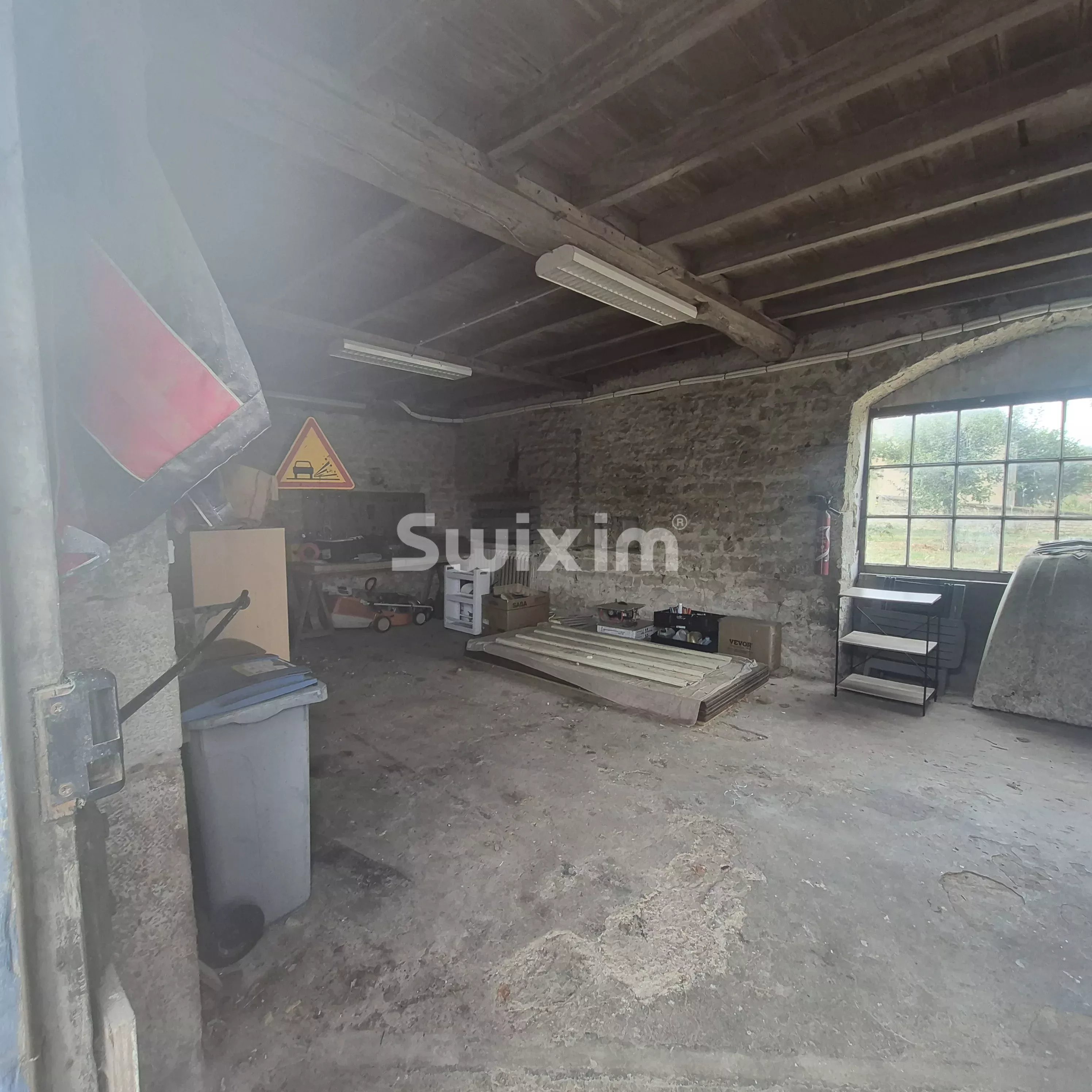 Beautiful stone house with garden and its adjoining barn